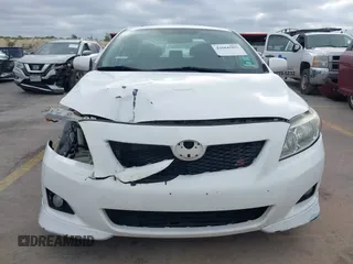 2010 Toyota Corolla with VIN 2T1BU4EEXAC521114, listed as a IAAI auction lot 42066903 with 208,509 mi miles. Bid and sale history available at carsss.com. Image 6.