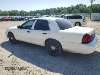 2010 Ford Police Interceptor with VIN 2FABP7BV7AX140870, listed as a Copart auction lot 53457275 with 124,194 mi miles and Salvage title. Bid and sale history available at DreamBid. Image 2.