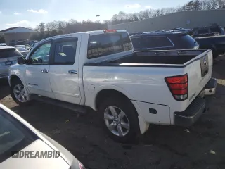 2011 Nissan Titan SL with VIN 1N6AA0EC7BN323825, listed as a Copart auction lot 46978315 with 143,228 mi miles and Salvage Title. Bid and sale history available at carsss.com. Image 2.