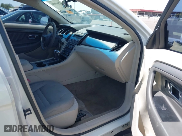 2011 Ford Taurus SE with VIN 1FAHP2DW1BG165371, listed as a IAAI auction lot 42164608 with 186,485 mi miles. Bid and sale history available at carsss.com. Image 5.