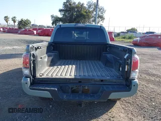 2022 Toyota Tacoma SR with VIN 3TMCZ5AN7NM501028, listed as a IAAI auction lot 42537868 with 42,186 mi miles and . Bid and sale history available at DreamBid. Image 16.