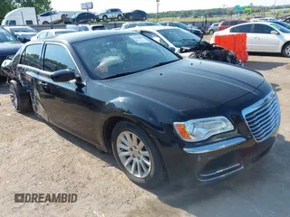 2013 Chrysler 300 with VIN 2C3CCAAG9DH529913, listed as a IAAI auction lot 42458630 with 153,513 mi miles and . Bid and sale history available at DreamBid. Image 1.