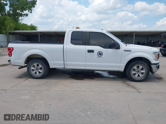 2018 Ford F-150 XL z VIN 1FTEX1CB3JKC44462, wystawiony jako IAAI lot #42597699 z przebiegiem 165 692 mil mil oraz . Historia ofert i sprzedaży dostępna na DreamBid. Obrazek 13.