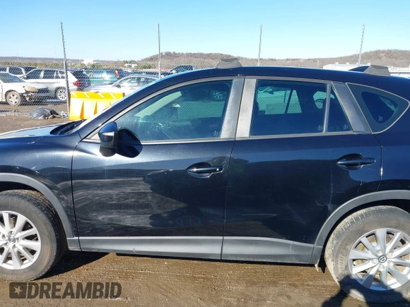 2016 Mazda CX-5 Sport with VIN JM3KE4BY0G0662294, listed as a IAAI auction lot 41469721 with 127,116 mi miles and . Bid and sale history available at carsss.com. Image 14.