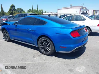 2021 Ford Mustang EcoBoost with VIN 1FA6P8TH0M5119073, listed as a IAAI auction lot 42225499 with 52,165 mi miles and . Bid and sale history available at DreamBid. Image 3.