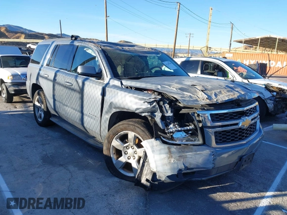 2016 Chevrolet Tahoe LS with VIN 1GNSCAKC0GR413515, listed as a IAAI auction lot 41249760 with 163,107 mi miles and . Bid and sale history available at DreamBid. Image 1.