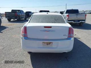 2014 Chrysler 300 with VIN 2C3CCAEG4EH312930, listed as a IAAI auction lot 41907509 with 128,940 mi miles. Bid and sale history available at carsss.com. Image 16.