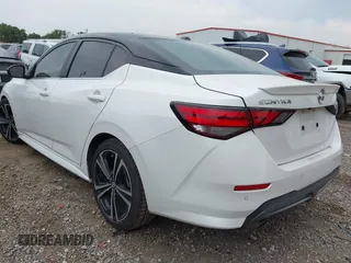2020 Nissan Sentra SR z VIN 3N1AB8DV6LY241609, wystawiony jako IAAI lot #42255322 z przebiegiem 52 193 mil mil oraz . Historia ofert i sprzedaży dostępna na DreamBid. Obrazek 3.