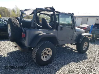 2002 Jeep Wrangler Sport with VIN 1J4FA49S92P715480, listed as a Copart auction lot 55157545 with 153,560 mi miles and Clean Title. Bid and sale history available at carsss.com. Image 3.