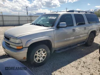 2004 Chevrolet Suburban Z71 z VIN 3GNFK16Z34G275757, wystawiony jako Copart lot #56422775 z przebiegiem 209 661 mil mil oraz Czysty tytuł • Clean title. Historia ofert i sprzedaży dostępna na DreamBid. Obrazek 1.