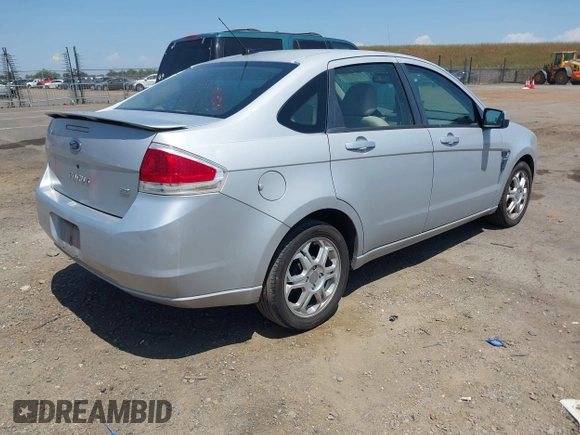 2008 Ford Focus SE with VIN 1FAHP35N28W300528, listed as a IAAI auction lot 42149643 with 138,115 mi miles. Bid and sale history available at carsss.com. Image 4.