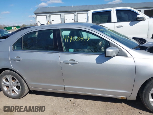2012 Ford Fusion SE with VIN 3FAHP0HA9CR210330, listed as a IAAI auction lot 41988499 with 165,395 mi miles and . Bid and sale history available at DreamBid. Image 14.