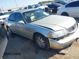 2004 Acura RL w/Navigation System with VIN JH4KA96674C007830, listed as a IAAI auction lot 41146234 with 80,611 mi miles. Bid and sale history available at carsss.com. Image 1.