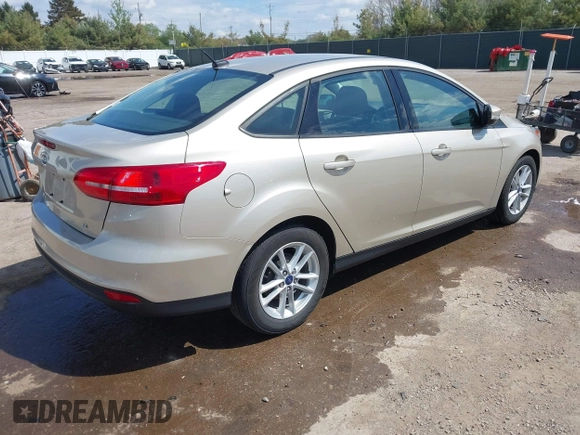 2017 Ford Focus SE with VIN 1FADP3F29HL229459, listed as a IAAI auction lot 42183686 with 35,102 mi miles and . Bid and sale history available at DreamBid. Image 4.