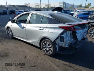 2022 Toyota Prius LE z VIN JTDKAMFP8N3211485, wystawiony jako IAAI lot #42515220 z przebiegiem 23 875 mil mil oraz . Historia ofert i sprzedaży dostępna na DreamBid. Obrazek 3.
