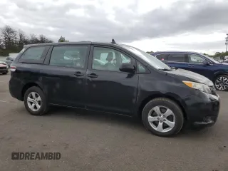 2014 Toyota Sienna L with VIN 5TDZK3DC2ES480859, listed as a Copart auction lot 72732274 with 174,276 mi miles and Non Repairable. Bid and sale history available at carsss.com. Image 4.