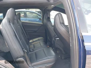2018 Tesla Model X 75D with VIN 5YJXCAE21JF132628, listed as a IAAI auction lot 42081282 with 35,360 mi miles and . Bid and sale history available at carsss.com. Image 8.