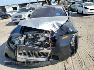 2012 Rolls-Royce Ghost z VIN SCA664S57CUX50671, wystawiony jako Copart lot #84172874 z przebiegiem Nie podano mil oraz Szkody całkowita. Historia ofert i sprzedaży dostępna na DreamBid. Obrazek 5.
