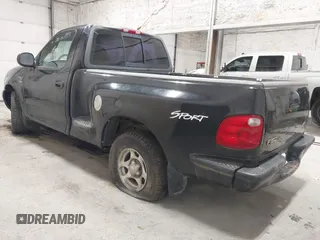 2001 Ford F-150 with VIN 2FTRF07W01CA32084, listed as a IAAI auction lot 42283557 with Not provided miles and . Bid and sale history available at DreamBid. Image 3.