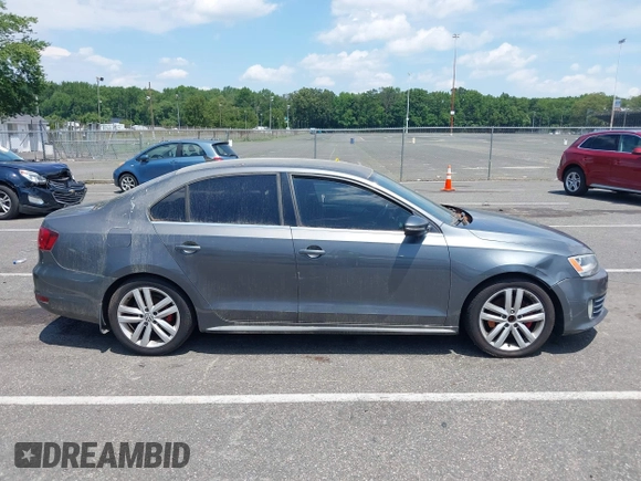 2014 Volkswagen Jetta GLI Autobahn with VIN 3VW5T7AJ6EM201416, listed as a IAAI auction lot 42684207 with 164,905 mi miles and . Bid and sale history available at DreamBid. Image 13.