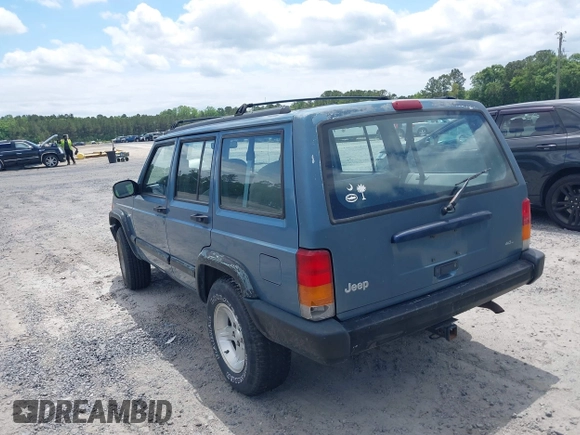 1998 Jeep Cherokee Sport with VIN 1J4FT68S6WL272337, listed as a IAAI auction lot 42147195 with 302,764 mi miles. Bid and sale history available at carsss.com. Image 3.