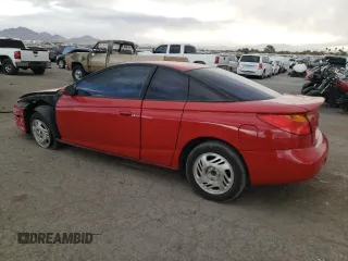 2001 Saturn SC with VIN 1G8ZY12701Z201761, listed as a Copart auction lot 76792804 with 85,352 mi miles and Salvage Title. Bid and sale history available at carsss.com. Image 2.