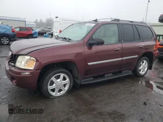 2007 GMC Envoy SLE with VIN 1GKDT13S372265140, listed as a Copart auction lot 84198914 with 256,650 mi miles and Salvage Title. Bid and sale history available at carsss.com. Image 1.