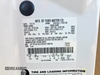 2014 Ford F-150 XL with VIN 1FTFW1EF0EKF18679, listed as a Copart auction lot 60872435 with 128,203 mi miles and Salvage title. Bid and sale history available at DreamBid. Image 12.