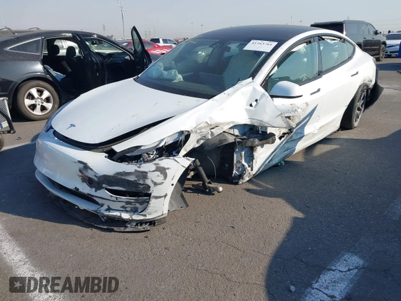 2022 Tesla Model 3 with VIN 5YJ3E1EA4NF319237, listed as a IAAI auction lot 41263761 with 44,384 mi miles and . Bid and sale history available at DreamBid. Image 17.