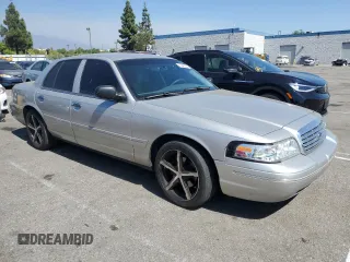2004 Ford Crown Victoria LX с VIN 2FAFP74W44X184918, выставлен на аукционе Copart как лот 73346744 с пробегом 157 925 миль миль и Списание • Salvage title. История ставок и продаж доступна на DreamBid. Изображение 4.