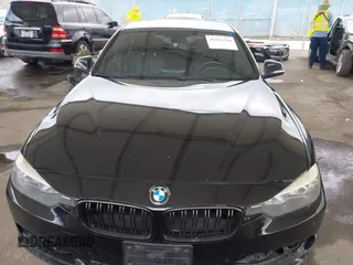 2014 BMW 3 Series 328i with VIN WBA3C1G53ENR49917, listed as a IAAI auction lot 42116704 with 148,630 mi miles and . Bid and sale history available at carsss.com. Image 13.