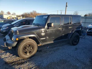 2012 Jeep Wrangler Unlimited Rubicon with VIN 1C4HJWFG1CL221083, listed as a Copart auction lot 80081654 with 163,912 mi miles and Salvage title. Bid and sale history available at DreamBid. Image 1.