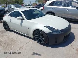 2004 Nissan 350Z Touring z VIN JN1AZ34E34T060024, wystawiony jako IAAI lot #42327915 z przebiegiem 96 197 mil mil oraz . Historia ofert i sprzedaży dostępna na DreamBid. Obrazek 1.