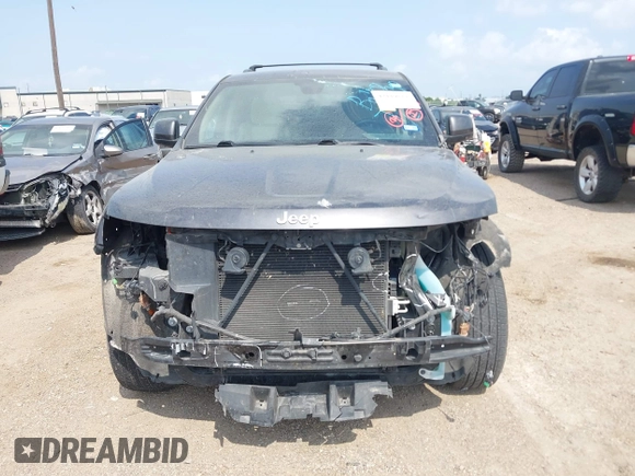 2020 Jeep Grand Cherokee Laredo E with VIN 1C4RJEAG2LC284912, listed as a IAAI auction lot 42114881 with 86,579 mi miles and . Bid and sale history available at DreamBid. Image 13.