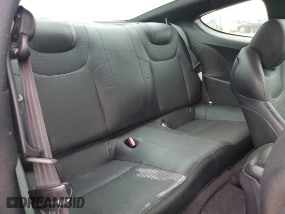 2013 Hyundai Genesis Coupe Grand Touring z VIN KMHHU6KJXDU089084, wystawiony jako Copart lot #67877224 z przebiegiem 67 658 mil mil oraz Czysty tytuł • Clean title. Historia ofert i sprzedaży dostępna na DreamBid. Obrazek 10.