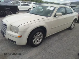 2005 Chrysler 300 Touring with VIN 2C3AA53G75H663208, listed as a IAAI auction lot 42180449 with 353,034 mi miles and . Bid and sale history available at carsss.com. Image 2.