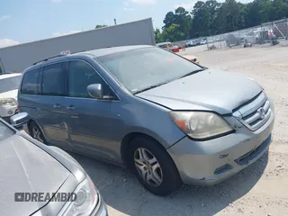 2005 Honda Odyssey EX-L with VIN 5FNRL387X5B036630, listed as a IAAI auction lot 42589046 with 252,529 mi miles and . Bid and sale history available at DreamBid. Image 1.