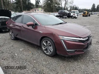 2018 Honda Clarity Plug-In Hybrid with VIN JHMZC5F10JC023952, listed as a Copart auction lot 87319574 with 43,935 mi miles and Salvage Title. Bid and sale history available at carsss.com. Image 4.