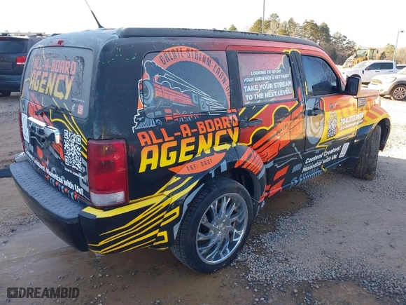2011 Dodge Nitro SXT with VIN 1D4PU5GK9BW535743, listed as a IAAI auction lot 41200573 with 155,239 mi miles. Bid and sale history available at carsss.com. Image 4.