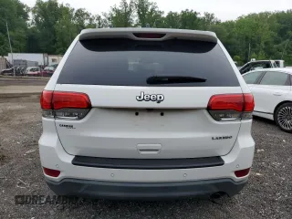 2018 Jeep Grand Cherokee Laredo E with VIN 1C4RJEAGXJC430096, listed as a Copart auction lot 57391405 with 89,248 mi miles and Salvage title. Bid and sale history available at DreamBid. Image 6.