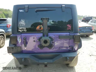 2018 Jeep Wrangler JK Unlimited Sport S with VIN 1C4BJWDGXJL911081, listed as a Copart auction lot 69205464 with 117,576 mi miles and Salvage Title. Bid and sale history available at carsss.com. Image 6.