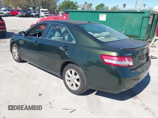 2011 Toyota Camry LE with VIN 4T4BF3EK2BR144228, listed as a IAAI auction lot 41754726 with 124,852 mi miles. Bid and sale history available at carsss.com. Image 3.