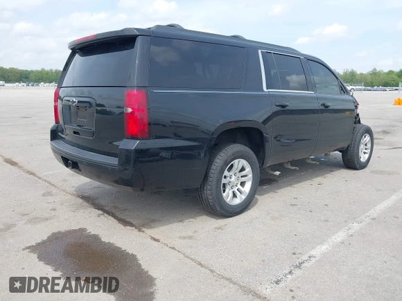 2019 Chevrolet Suburban LS with VIN 1GNSKGKC4KR128685, listed as a IAAI auction lot 42148721 with 92,346 mi miles and . Bid and sale history available at DreamBid. Image 4.