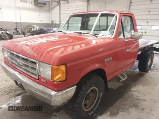1987 Ford Pickup with VIN 1FTEF14Y7HLA55470, listed as a IAAI auction lot 42030305 with 33,453 mi miles. Bid and sale history available at carsss.com. Image 2.