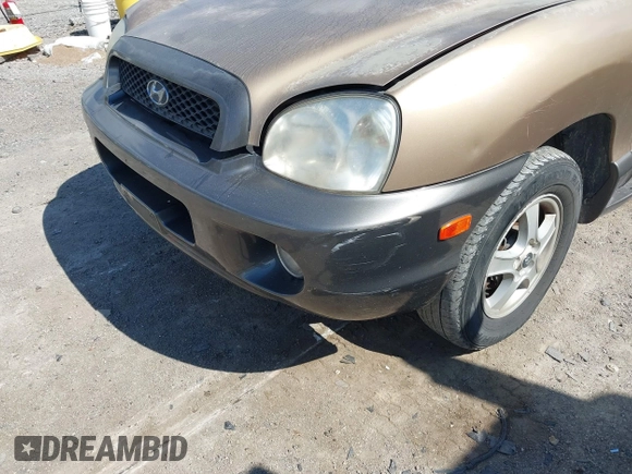 2004 Hyundai Santa Fe GLS z VIN KM8SC73EX4U814067, wystawiony jako IAAI lot #40404373 z przebiegiem 182 101 mil mil oraz . Historia ofert i sprzedaży dostępna na DreamBid. Obrazek 6.