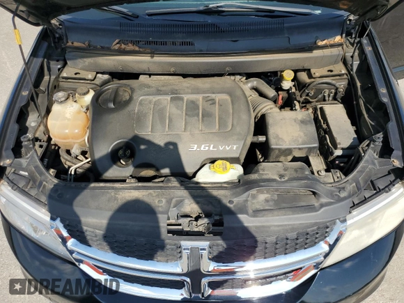 2014 Dodge Journey SXT with VIN 3C4PDCBG5ET126590, listed as a Copart auction lot 54770335 with 126,950 mi miles and Salvage Title. Bid and sale history available at DreamBid. Image 12.