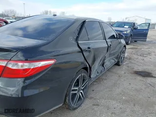 2015 Toyota Camry Hybrid LE with VIN 4T1BD1FK5FU166653, listed as a IAAI auction lot 41412963 with 105,428 mi miles. Bid and sale history available at carsss.com. Image 6.