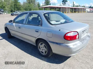 2001 Kia Sephia z VIN KNAFB121515092630, wystawiony jako IAAI lot #42361635 z przebiegiem 183 434 mil mil oraz . Historia ofert i sprzedaży dostępna na DreamBid. Obrazek 3.