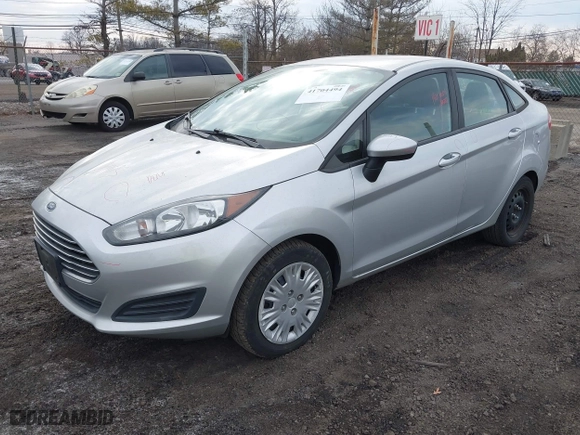 2015 Ford Fiesta S with VIN 3FADP4AJ5FM125857, listed as a IAAI auction lot 41704494 with 73,151 mi miles. Bid and sale history available at carsss.com. Image 2.