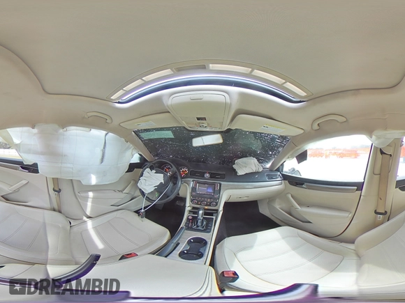 2017 Volkswagen Passat SE z VIN 1VWBT7A39HC030560, wystawiony jako Copart lot #55443585 z przebiegiem 125 397 mil mil oraz Szkoda całkowita • Salvage title. Historia ofert i sprzedaży dostępna na DreamBid. Obrazek 14.